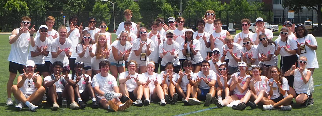 Tech Wreck Camp ATL participants forming a W with their hands.